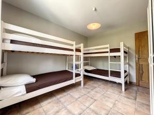 Łóżko lub łóżka w pokoju w obiekcie Maison location bedoin