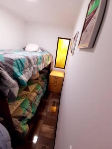 Postel nebo postele na pokoji v ubytování Cabañas Garcia