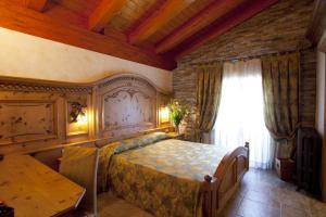 Postel nebo postele na pokoji v ubytování Hotel Le Ortensie