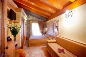 Postel nebo postele na pokoji v ubytování Hotel Le Ortensie