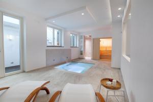 Postel nebo postele na pokoji v ubytování Villa Flavia + 39 fotografií