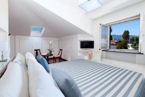 TV a/nebo společenská místnost v ubytování Villa Flavia