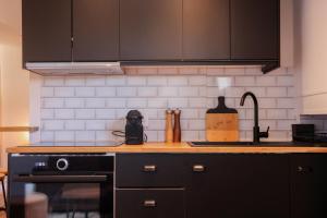 Köök või kööginurk majutusasutuses Villa Corbelle - Grand Studio