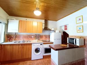 Kuchyň nebo kuchyňský kout v ubytování Casa Raspa + 29 fotografií