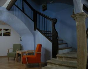 A seating area at Hotel Portal Del Matarraña