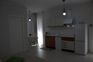 Kuchyň nebo kuchyňský kout v ubytování B&B Sibi