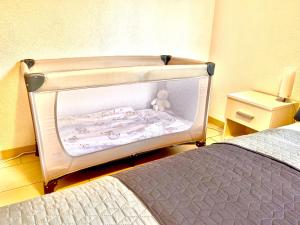 Postel nebo postele na pokoji v ubytování LuxuryOrion,nahe Europapark & Rulantica,Netflix,Disney,KartinaTV