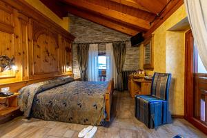 Postel nebo postele na pokoji v ubytování Hotel Le Ortensie