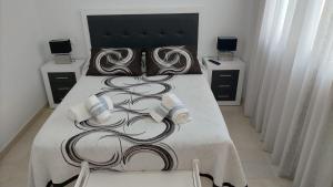 Postel nebo postele na pokoji v ubytování Ático dúplex con gran terraza por habitaciones