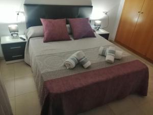 Postel nebo postele na pokoji v ubytování Ático dúplex con gran terraza por habitaciones