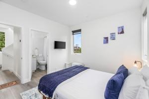 Postel nebo postele na pokoji v ubytování Stag Sweet Suite