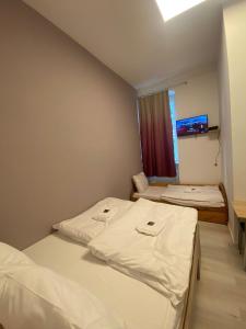 Ein Bett oder Betten in einem Zimmer der Unterkunft Stadtoase im Herzen Berlins
