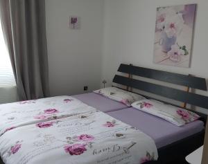 Posteľ alebo postele v izbe v ubytovaní Apartman GRIZZLY