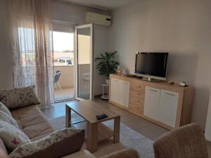 Μια τηλεόραση ή/και κέντρο ψυχαγωγίας στο HELA Lux apartment