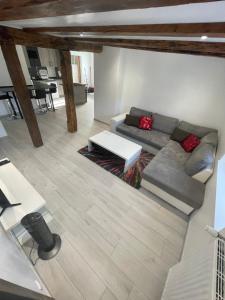 Posezení v ubytování Appartement proche de la Suisse