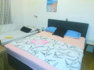 Postel nebo postele na pokoji v ubytování Apartman Arija-Pino