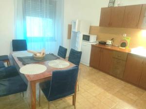 Kuchyň nebo kuchyňský kout v ubytování Apartman Arija-Pino