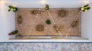 a large room with a wall with lights on it at Atlantic Bliss in Albufeira