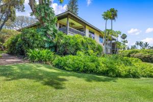 a house with a garden in front of it at Kaanapali Plantation 53 in Lahaina