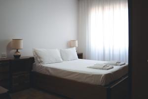 Voodi või voodid majutusasutuse L’Archè Comfort&Relax – Old Style House toas