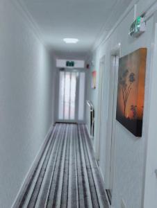 TV a/nebo společenská místnost v ubytování Aaran Central Guesthouse