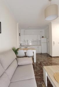 Apartamento DREAM BAENA tesisinde bir oturma alanı