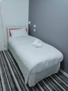 Postel nebo postele na pokoji v ubytování Aaran Central Guesthouse