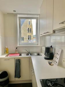 Η κουζίνα ή μικρή κουζίνα στο Appartement centrum van De Panne