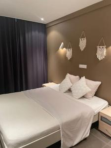 Ένα ή περισσότερα κρεβάτια σε δωμάτιο στο Appartement centrum van De Panne