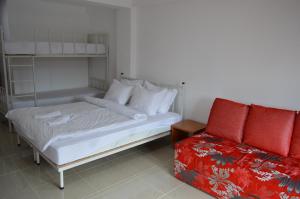 מיטה או מיטות בחדר ב-BEROVO VIP HOTEL
