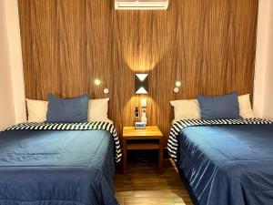 Postel nebo postele na pokoji v ubytování Sky Inn Hotel - Cancun