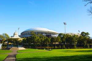 a large building with a gazebo in a park at Adelaide Caravan Park - Aspen Holiday Parks in Adelaide