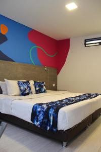 Postel nebo postele na pokoji v ubytování Agora Suites Self-Service Boutique Hotel