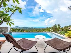 a view of a swimming pool from a villa at 25% OFF! 5 minutes to Chaweng beach in Nathon Bay