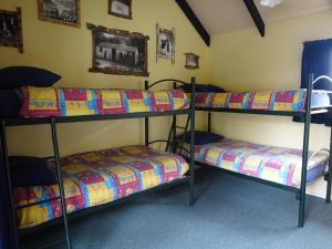 Letto o letti in una camera di Glow Worm Accommodation