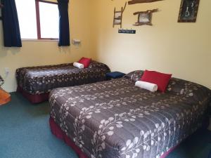 Letto o letti in una camera di Glow Worm Accommodation
