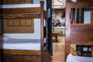 a room with two bunk beds in a room at Villa Candelaria Hostel in Bogotá