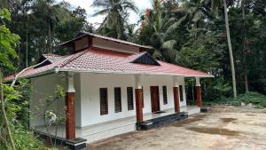 Fotografie z fotogalerie ubytování Rhythm Holiday Home v destinaci Sultan Bathery