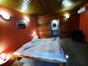 Postel nebo postele na pokoji v ubytování Ferme auberge le Ti'planteur