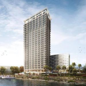 a rendering of a tall building next to the water at Batam Two Bedrooms Apartment - One Residence 25AJ in Batam Center