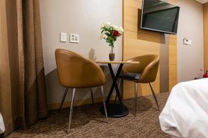 TV a/nebo společenská místnost v ubytování Eastern Hotel Jeju