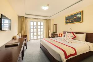 Voodi või voodid majutusasutuse Tien Sa Danang Hotel toas