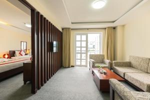 Voodi või voodid majutusasutuse Tien Sa Danang Hotel toas