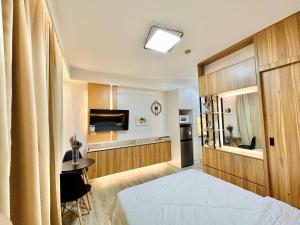 Giường trong phòng chung tại UNIT B218