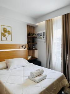 Giường trong phòng chung tại UNIT B218