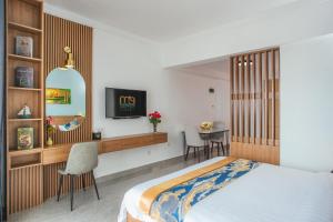 Postel nebo postele na pokoji v ubytování M9 Kirirom Hotel