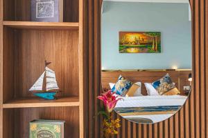 Postel nebo postele na pokoji v ubytování M9 Kirirom Hotel
