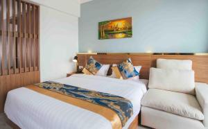 Postel nebo postele na pokoji v ubytování M9 Kirirom Hotel