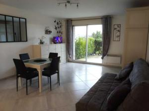 Χώρος καθιστικού στο Appartement a 2 pas de la plage