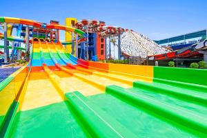 a colorful water slide in a water park at Pickalbatros Jungle Aqua Park - Neverland Hurghada in Hurghada